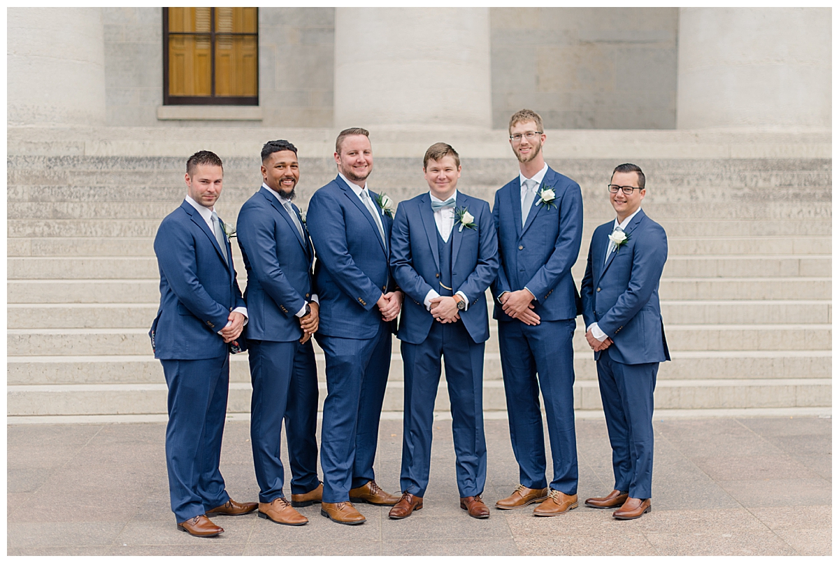Groomsmen in front of steps at ohio state house wedding taken by ashleigh grzybowski
