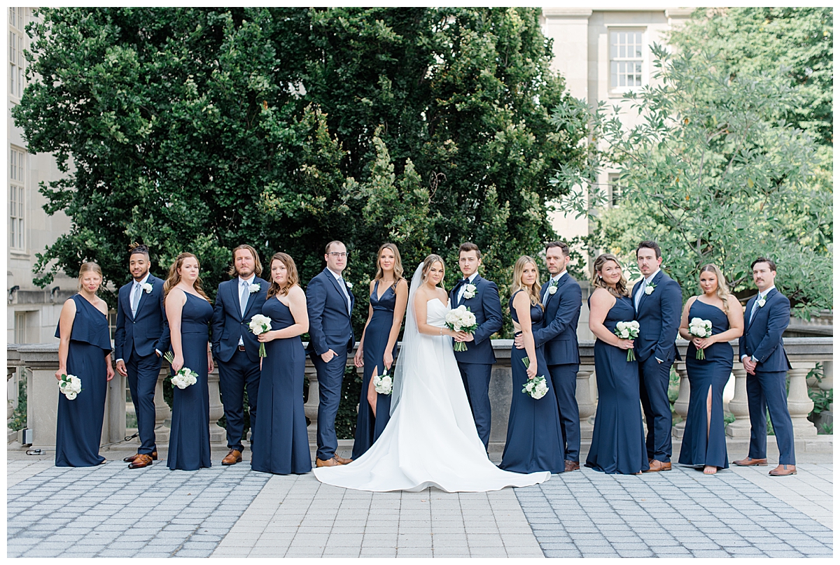 bridesmaids and groomsmen with bride and groom 