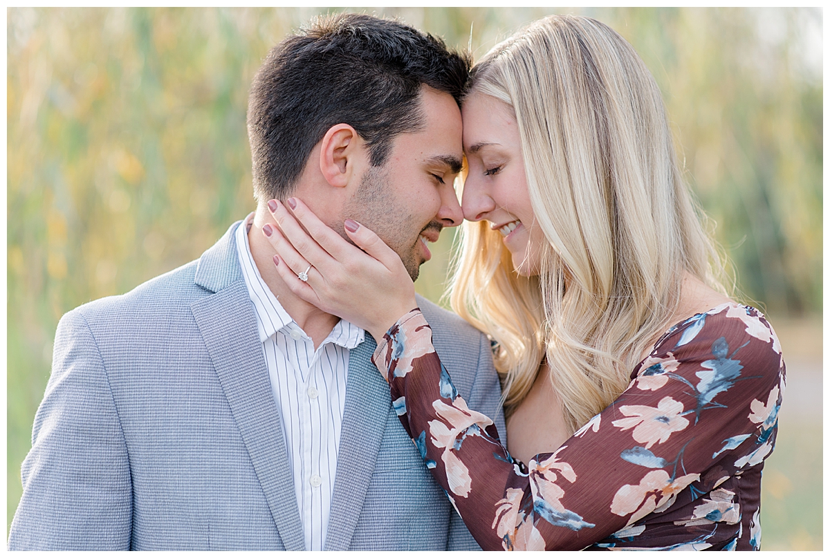 Couple with eye closed at Columbus, Ohio engagement session taken by Ohio Wedding Photographer Ashleigh Grzybowski