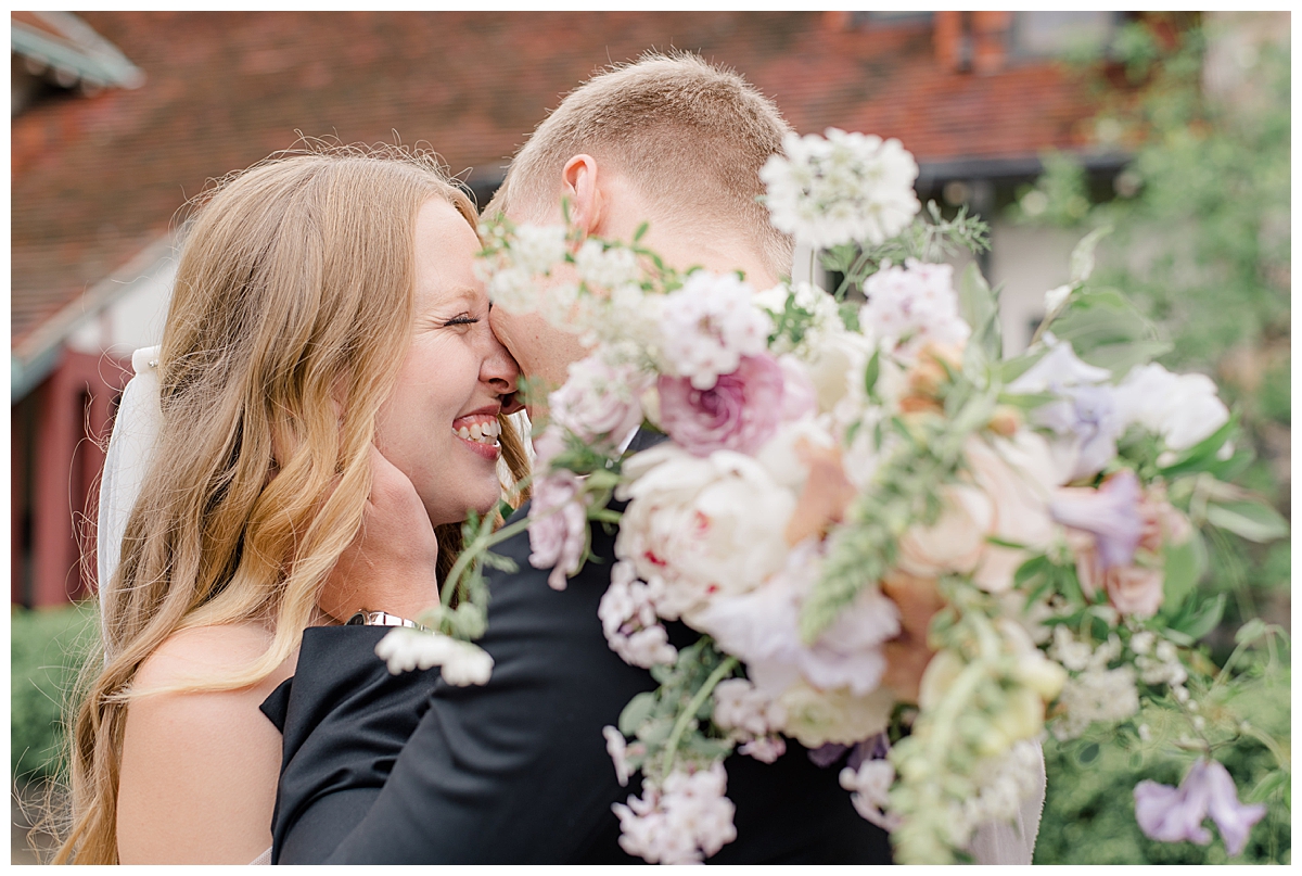 Bride and Groom kissing at Beverly Mansion taken by Columbus Ohio Wedding Photographer Ashleigh Grzybowski