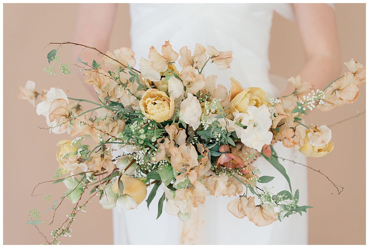 Earthy wedding florals by Stem Floral Studio photographed by Midwest photographer Ashleigh Grzybowski