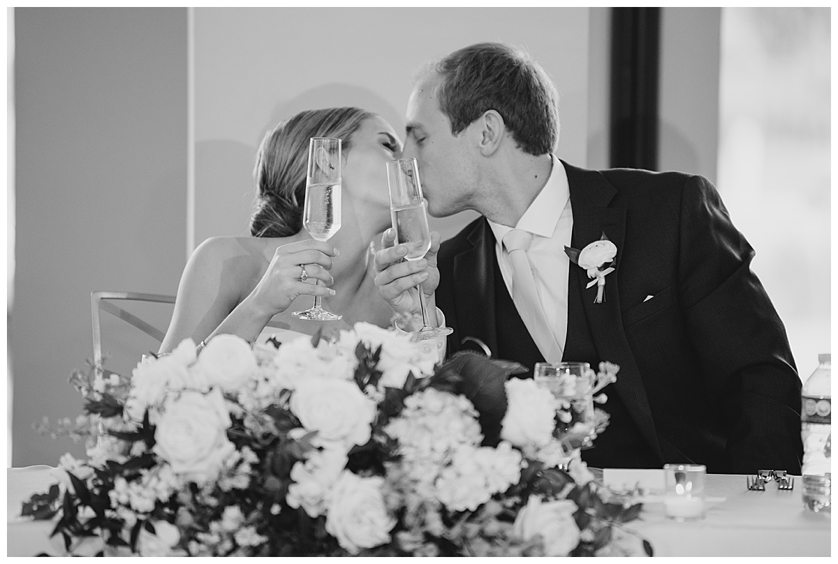 Bride and Groom kissing at Anderson Pavilion wedding reception in Cincinnati, Ohio