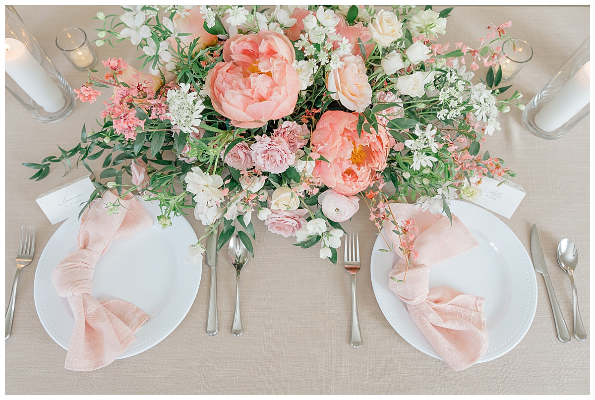 Wedding florals with bright pink flowers at Magnolia Hill Farm