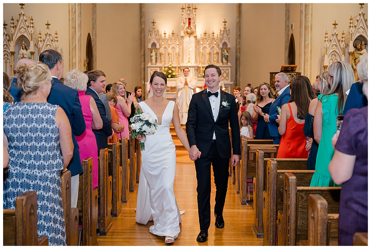 Bride and Groom walking together after wedding catholic wedding ceremony in Columbus, Ohio