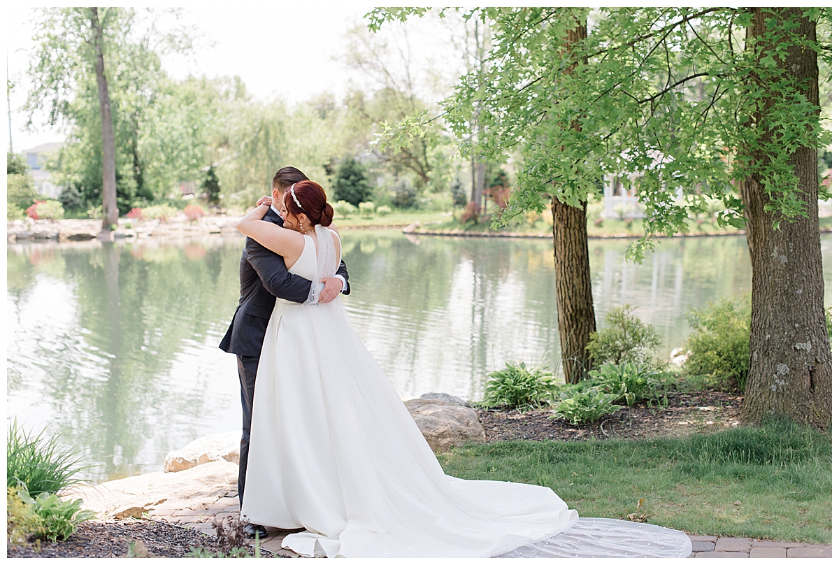 Bride and Groom hugging in Columbus, Ohio at Swan Lake Wedding